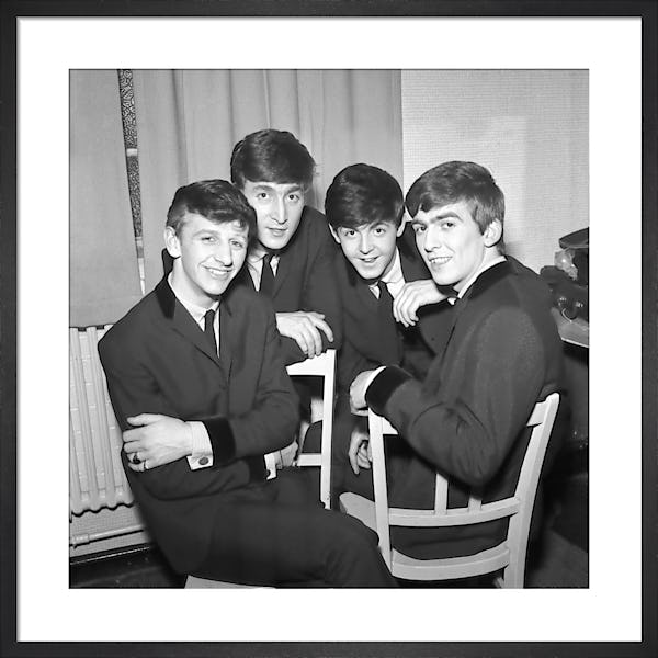Girl Sitting Beside a Colorful Flower Display - Copy zaPH