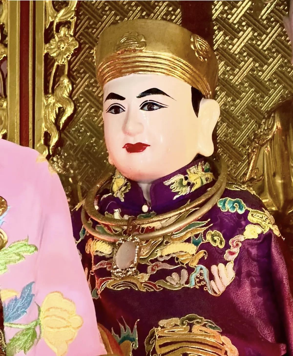 Regal Figurine in Traditional Attire