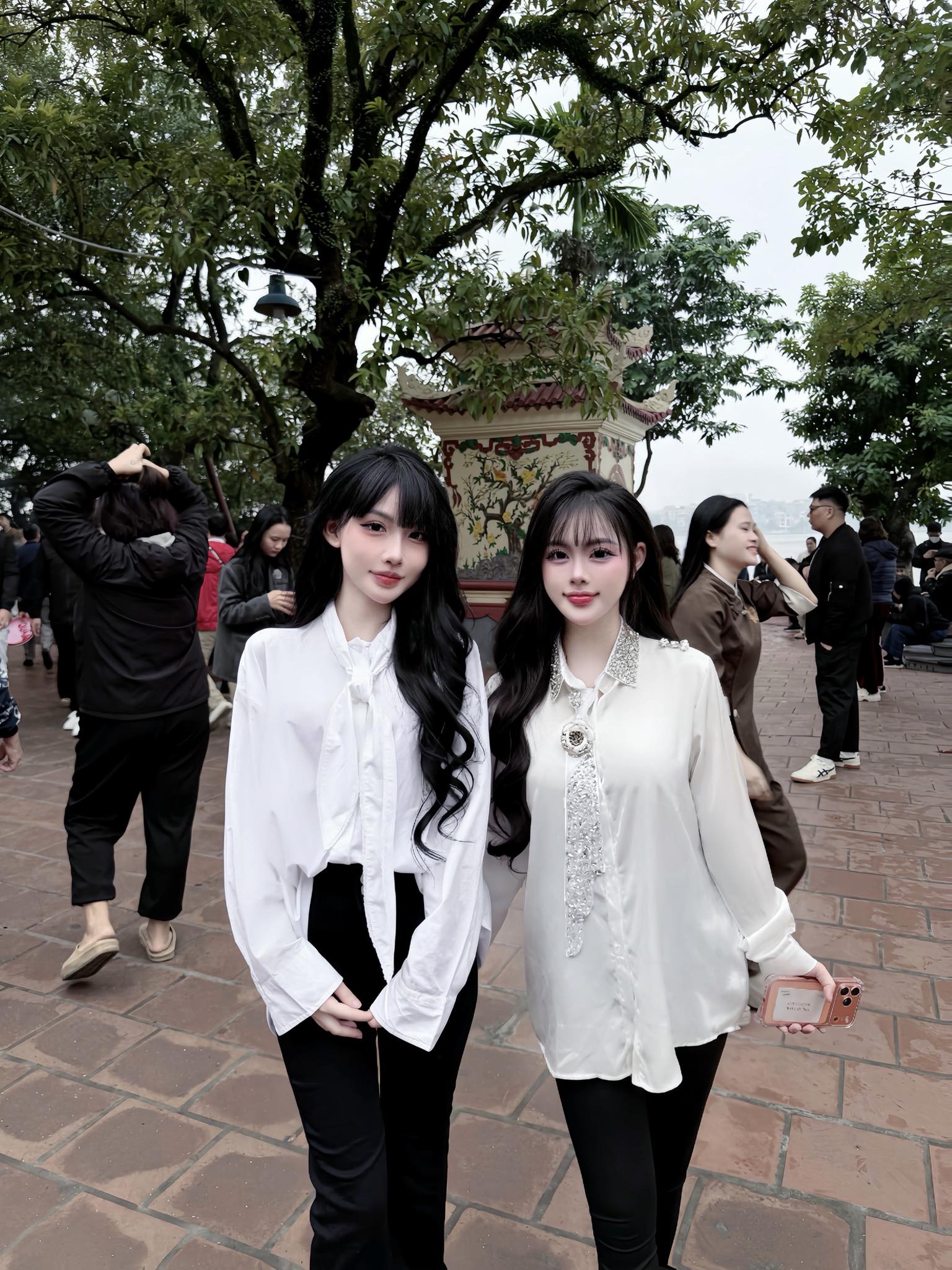 Elegant Companions in a Cultural Courtyard